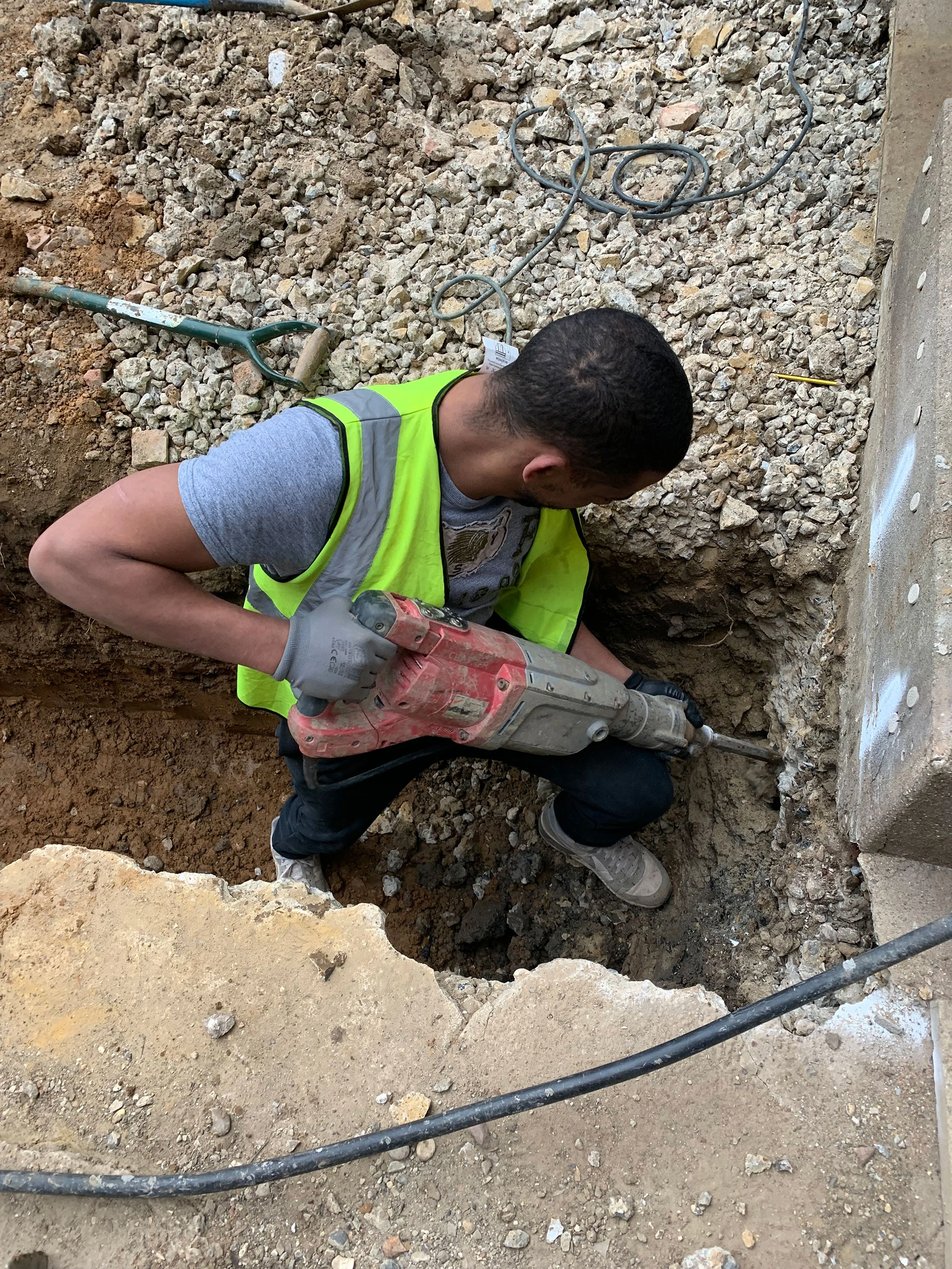 Worker using jackhammer