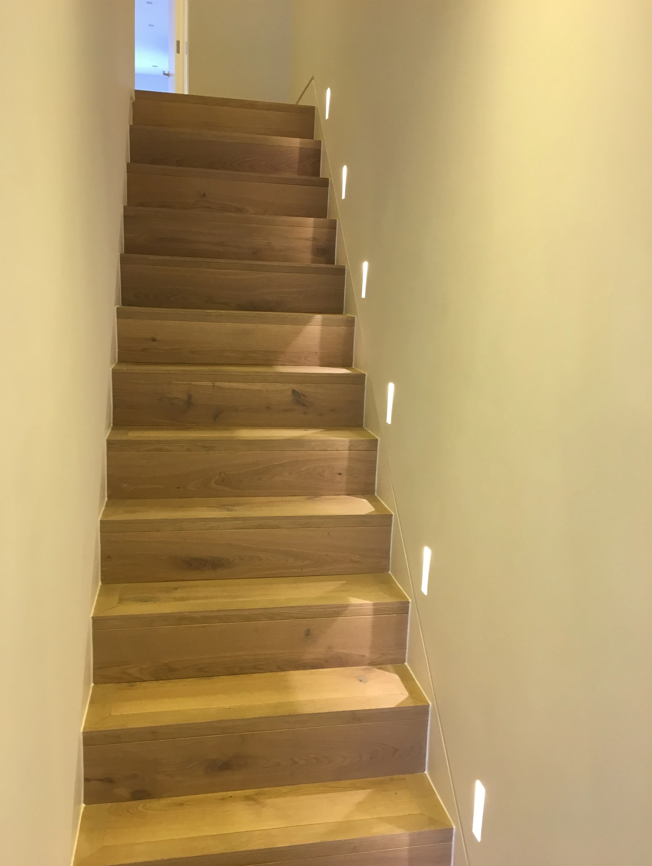 Wooden staircase lighting